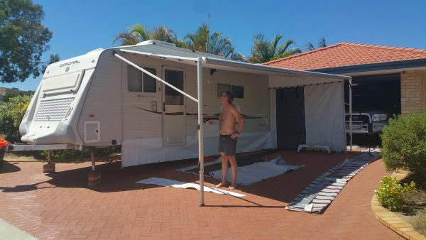 Erecting the annex in our driveway